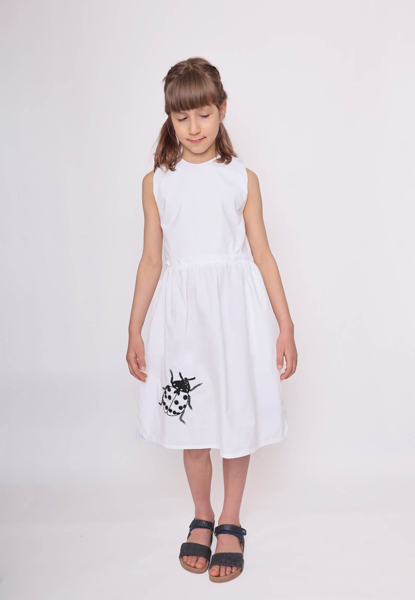 White Dress with Cutout Back and Ladybug Hand Embroidery